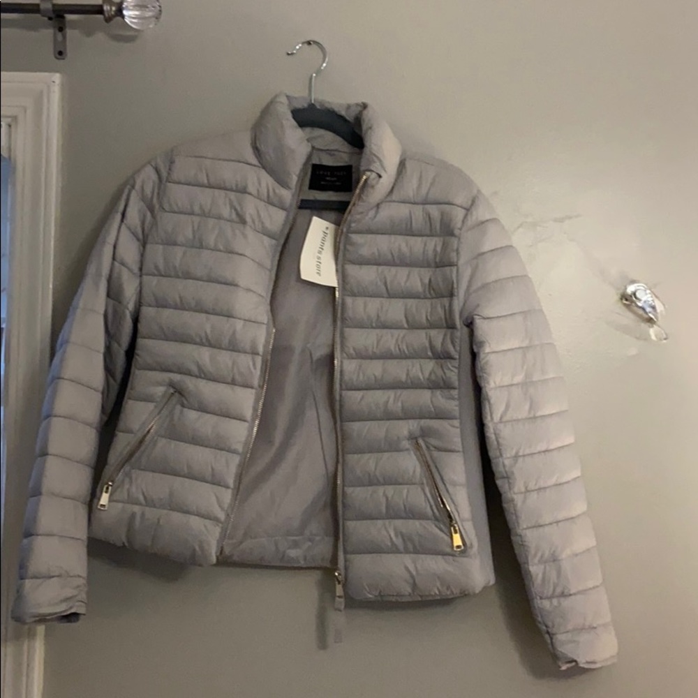 Super cute light grey puff jacket from pants store